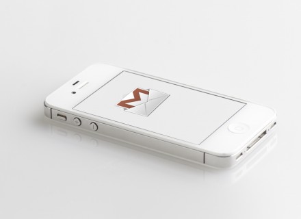image of white iPhone on white background with gryphmail logo on the screen.