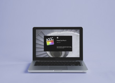 Photography of a Macbook Pro with the Final Cut Pro X launch screen visible